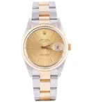 Rolex Oyster Perpetual Date, Ref. 15223, champagne dial, 18K Gold and Steel case luxury watch